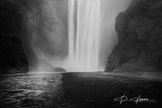 Dramatic thundering Skogafoss
