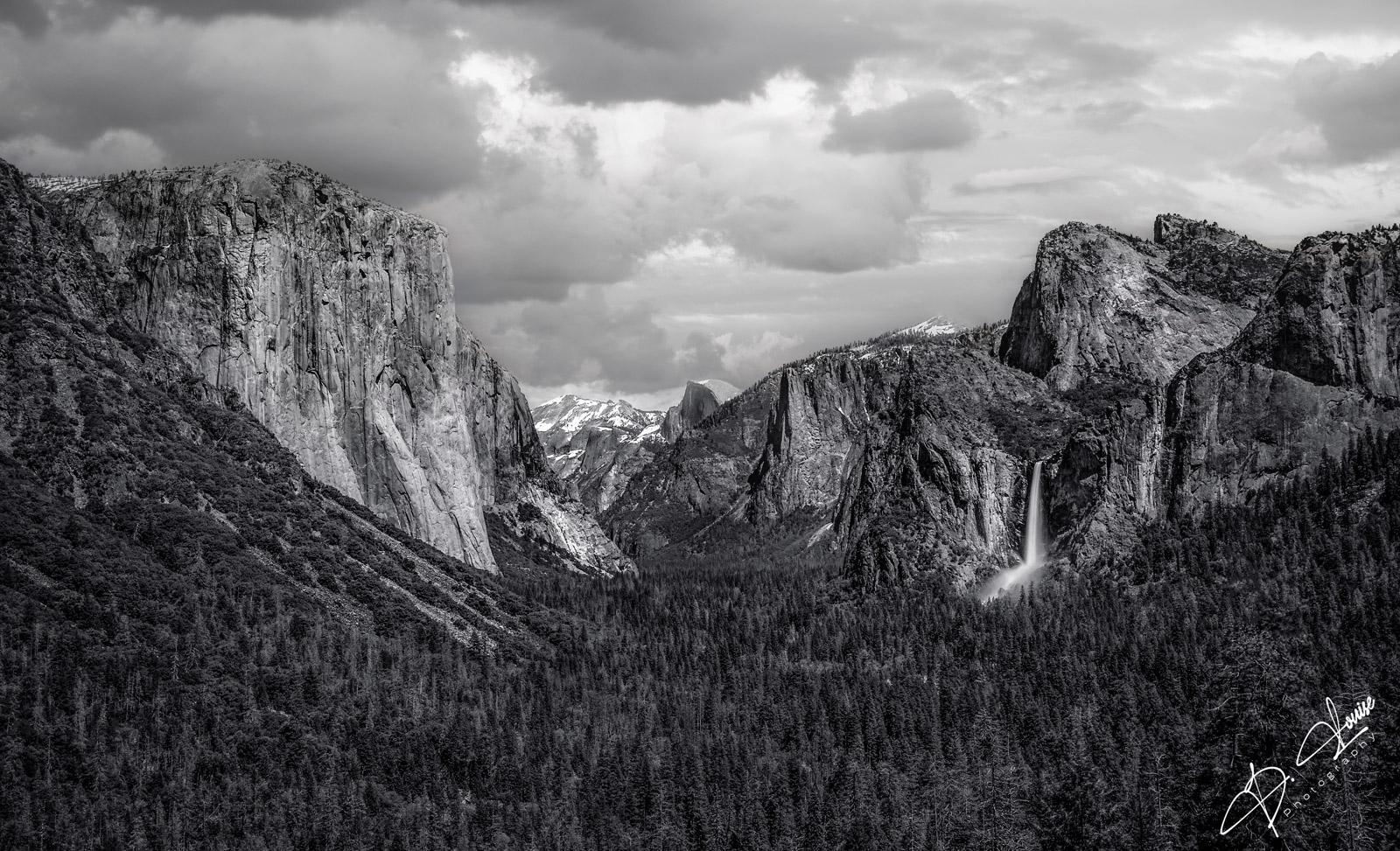 The drop your jaw landmark view as you pass through the Wawona Tunnel and get a glimpse of Bridal Veil Falls,  El Capitan and...